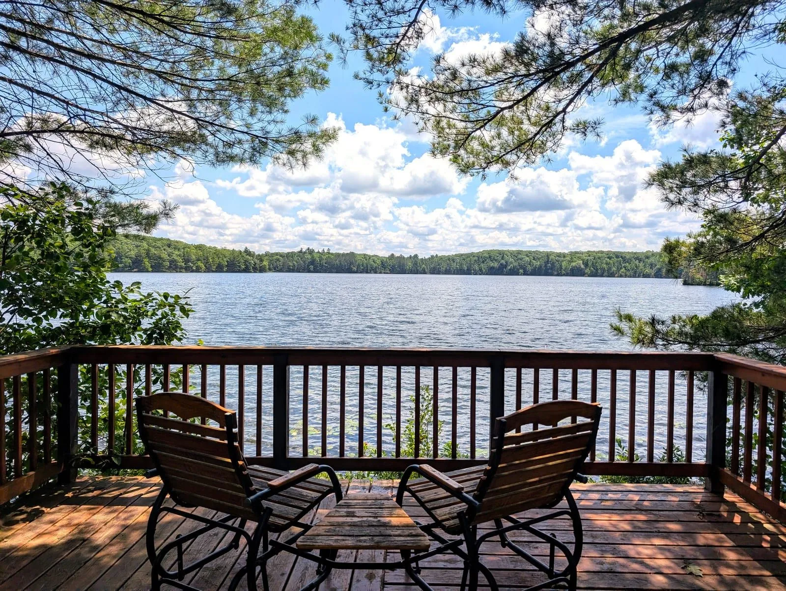 Lake deck with chairs overlooking White Birch Lake