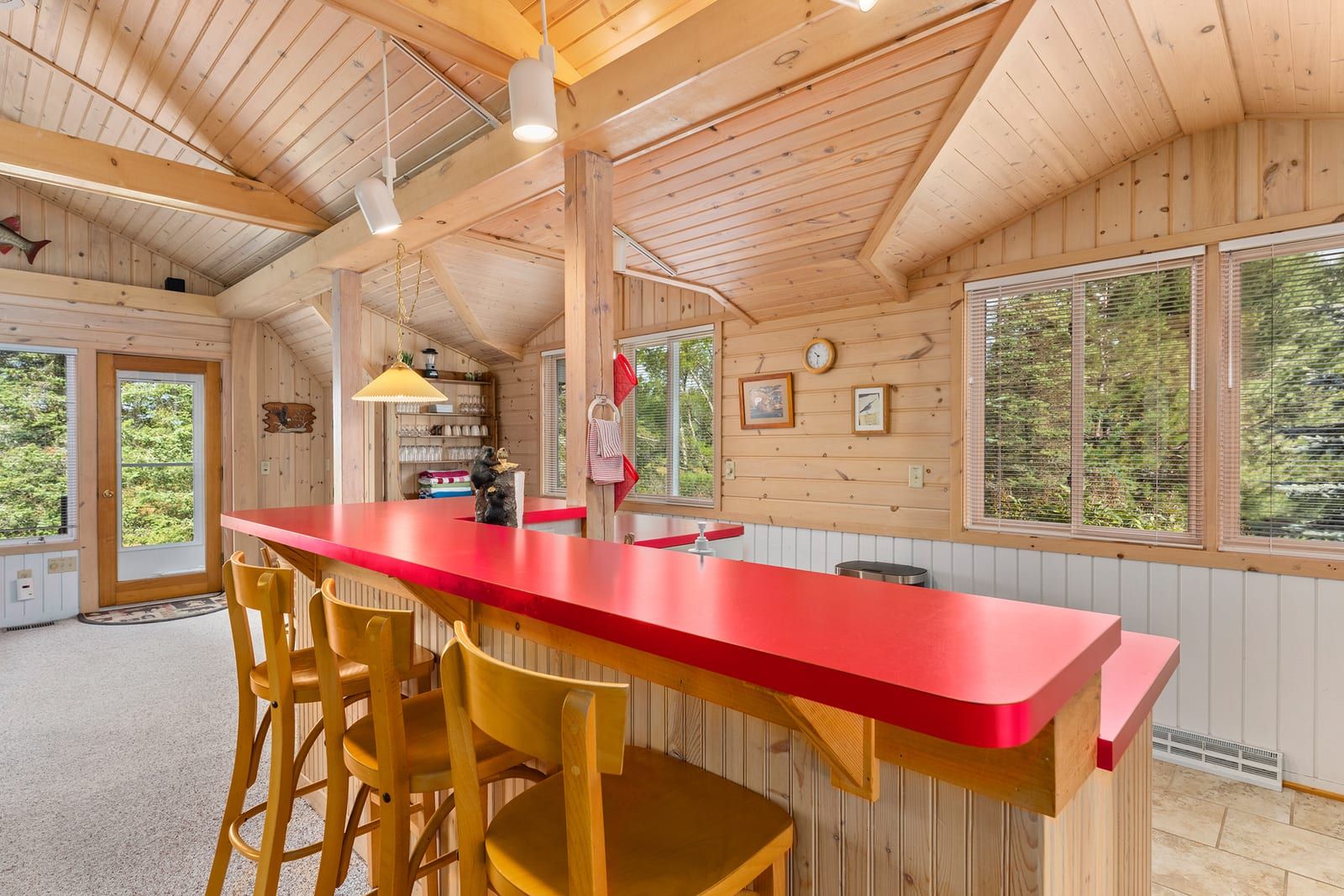 Kitchen bar seating with vaulted ceiling