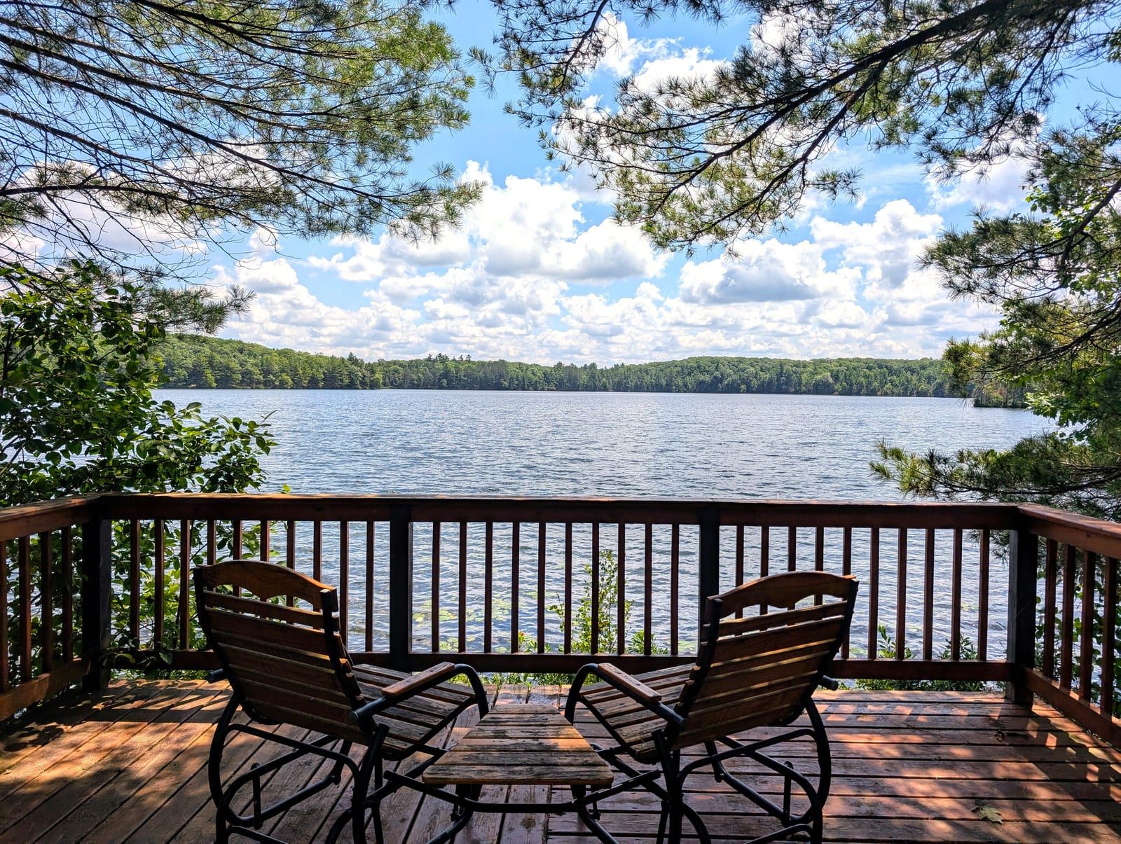 Lake deck with chairs overlooking White Birch Lake